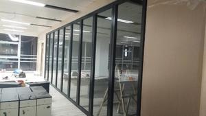 Full height stable glass partition